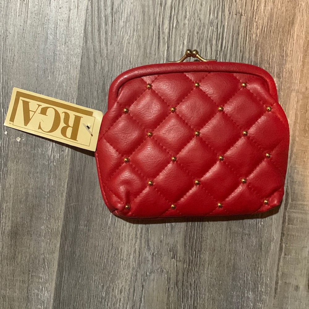 Brand new red Purse with gold accents.